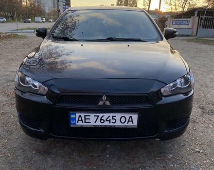 Черный Мицубиси Лансер, объемом двигателя 2 л и пробегом 175 тыс. км за 9200 $, фото 13 на Automoto.ua