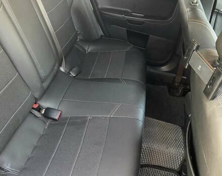 Черный Мицубиси Лансер, объемом двигателя 2 л и пробегом 175 тыс. км за 9200 $, фото 6 на Automoto.ua