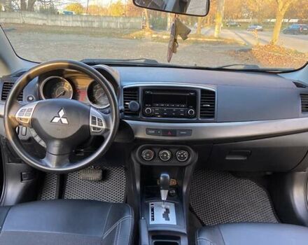 Черный Мицубиси Лансер, объемом двигателя 2 л и пробегом 175 тыс. км за 9200 $, фото 10 на Automoto.ua