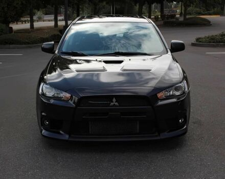 Чорний Міцубісі Lancer, об'ємом двигуна 2 л та пробігом 82 тис. км за 11000 $, фото 1 на Automoto.ua