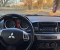 Черный Мицубиси Лансер, объемом двигателя 2 л и пробегом 175 тыс. км за 9200 $, фото 4 на Automoto.ua