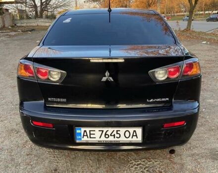 Черный Мицубиси Лансер, объемом двигателя 2 л и пробегом 175 тыс. км за 9200 $, фото 12 на Automoto.ua