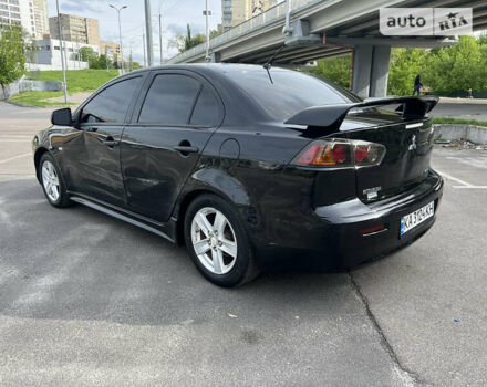 Чорний Міцубісі Lancer, об'ємом двигуна 2 л та пробігом 183 тис. км за 6500 $, фото 3 на Automoto.ua