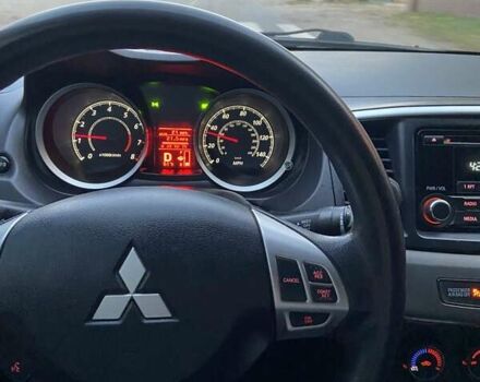 Черный Мицубиси Лансер, объемом двигателя 2 л и пробегом 175 тыс. км за 9200 $, фото 7 на Automoto.ua