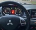 Черный Мицубиси Лансер, объемом двигателя 2 л и пробегом 175 тыс. км за 9200 $, фото 7 на Automoto.ua