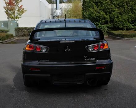 Чорний Міцубісі Lancer, об'ємом двигуна 2 л та пробігом 82 тис. км за 11000 $, фото 5 на Automoto.ua
