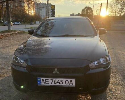 Черный Мицубиси Лансер, объемом двигателя 2 л и пробегом 175 тыс. км за 9200 $, фото 8 на Automoto.ua