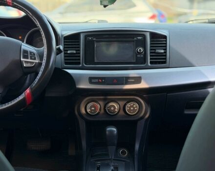 Черный Мицубиси Лансер, объемом двигателя 2.4 л и пробегом 160 тыс. км за 6700 $, фото 16 на Automoto.ua