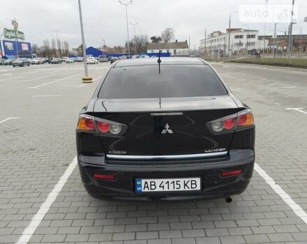 Чорний Міцубісі Lancer, об'ємом двигуна 2 л та пробігом 155 тис. км за 9250 $, фото 5 на Automoto.ua