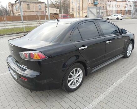 Чорний Міцубісі Lancer, об'ємом двигуна 2 л та пробігом 155 тис. км за 9250 $, фото 7 на Automoto.ua