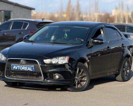 Черный Мицубиси Лансер, объемом двигателя 2.4 л и пробегом 160 тыс. км за 6700 $, фото 1 на Automoto.ua