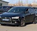 Черный Мицубиси Лансер, объемом двигателя 2.4 л и пробегом 160 тыс. км за 6700 $, фото 1 на Automoto.ua