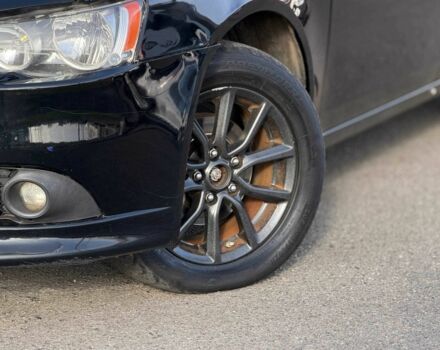 Черный Мицубиси Лансер, объемом двигателя 2.4 л и пробегом 160 тыс. км за 6700 $, фото 4 на Automoto.ua