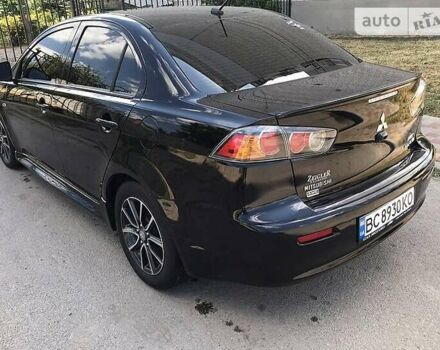 Чорний Міцубісі Lancer, об'ємом двигуна 2.36 л та пробігом 169 тис. км за 9000 $, фото 2 на Automoto.ua