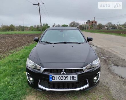 Чорний Міцубісі Lancer, об'ємом двигуна 2 л та пробігом 136 тис. км за 8700 $, фото 1 на Automoto.ua