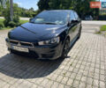 Чорний Міцубісі Lancer, об'ємом двигуна 2 л та пробігом 220 тис. км за 8500 $, фото 1 на Automoto.ua