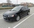 Чорний Міцубісі Lancer, об'ємом двигуна 2 л та пробігом 155 тис. км за 9250 $, фото 1 на Automoto.ua