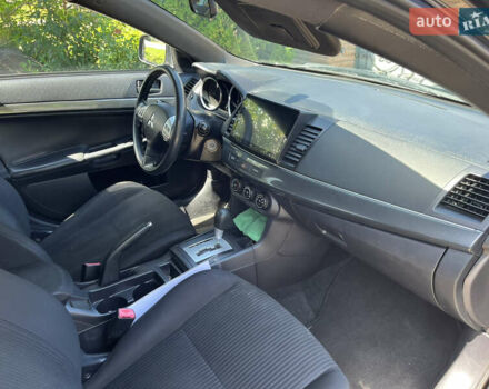 Чорний Міцубісі Lancer, об'ємом двигуна 2 л та пробігом 220 тис. км за 8500 $, фото 4 на Automoto.ua