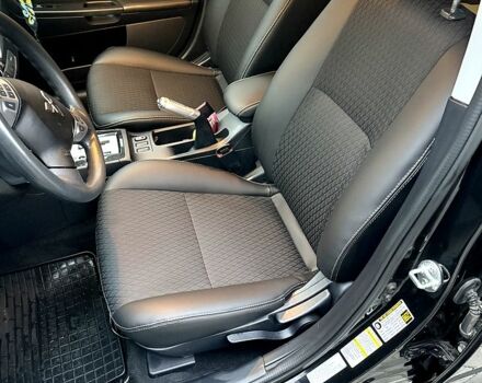 Черный Мицубиси Лансер, объемом двигателя 2.4 л и пробегом 118 тыс. км за 10200 $, фото 11 на Automoto.ua