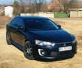 Чорний Міцубісі Lancer, об'ємом двигуна 2 л та пробігом 135 тис. км за 11000 $, фото 1 на Automoto.ua
