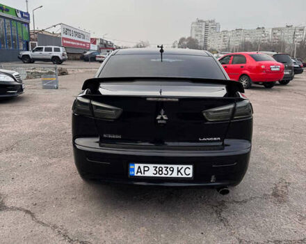 Черный Мицубиси Лансер, объемом двигателя 2 л и пробегом 156 тыс. км за 8999 $, фото 4 на Automoto.ua