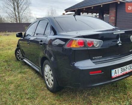 Чорний Міцубісі Lancer, об'ємом двигуна 2 л та пробігом 127 тис. км за 9600 $, фото 7 на Automoto.ua