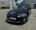 Чорний Міцубісі Lancer, об'ємом двигуна 2 л та пробігом 134 тис. км за 9000 $, фото 1 на Automoto.ua
