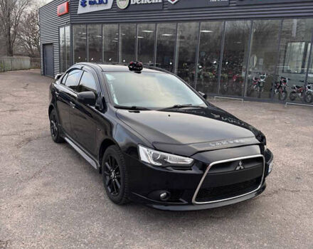 Черный Мицубиси Лансер, объемом двигателя 2 л и пробегом 156 тыс. км за 8999 $, фото 7 на Automoto.ua