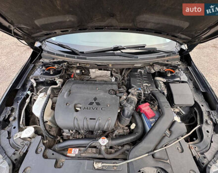 Черный Мицубиси Лансер, объемом двигателя 2 л и пробегом 156 тыс. км за 8999 $, фото 15 на Automoto.ua