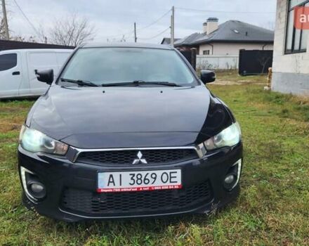 Чорний Міцубісі Lancer, об'ємом двигуна 2 л та пробігом 127 тис. км за 9600 $, фото 2 на Automoto.ua