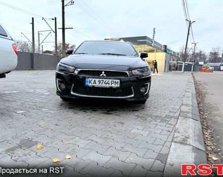 Черный Мицубиси Лансер, объемом двигателя 2.4 л и пробегом 118 тыс. км за 10200 $, фото 1 на Automoto.ua