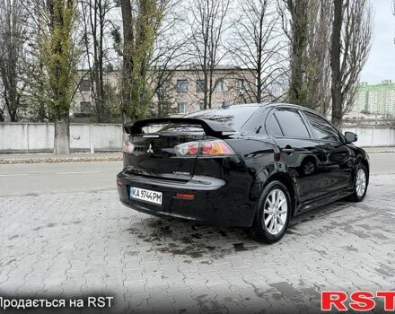 Черный Мицубиси Лансер, объемом двигателя 2.4 л и пробегом 118 тыс. км за 10200 $, фото 6 на Automoto.ua