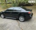 Чорний Міцубісі Lancer, об'ємом двигуна 2 л та пробігом 140 тис. км за 8200 $, фото 4 на Automoto.ua