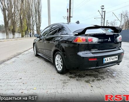 Черный Мицубиси Лансер, объемом двигателя 2.4 л и пробегом 118 тыс. км за 10200 $, фото 7 на Automoto.ua
