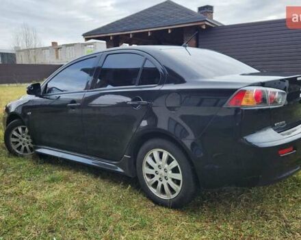 Чорний Міцубісі Lancer, об'ємом двигуна 2 л та пробігом 127 тис. км за 9600 $, фото 9 на Automoto.ua