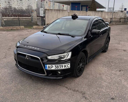 Черный Мицубиси Лансер, объемом двигателя 2 л и пробегом 156 тыс. км за 8999 $, фото 1 на Automoto.ua