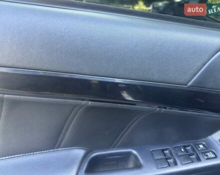 Черный Мицубиси Лансер, объемом двигателя 2.36 л и пробегом 178 тыс. км за 9300 $, фото 12 на Automoto.ua