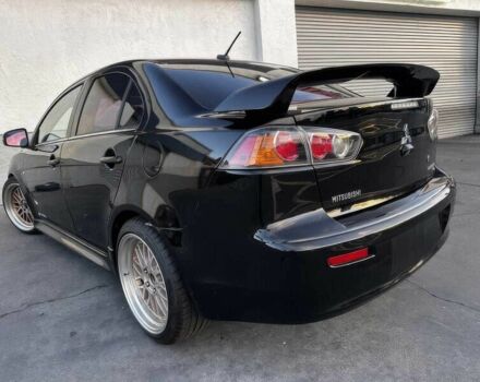 Черный Мицубиси Лансер, объемом двигателя 2.4 л и пробегом 76 тыс. км за 9200 $, фото 4 на Automoto.ua