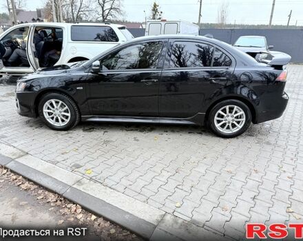 Черный Мицубиси Лансер, объемом двигателя 2.4 л и пробегом 118 тыс. км за 10200 $, фото 8 на Automoto.ua