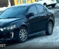 Чорний Міцубісі Lancer, об'ємом двигуна 2 л та пробігом 12800 тис. км за 9000 $, фото 1 на Automoto.ua