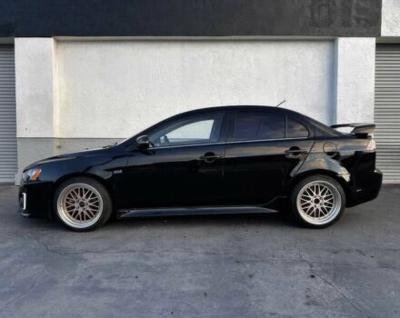 Черный Мицубиси Лансер, объемом двигателя 2.4 л и пробегом 76 тыс. км за 9200 $, фото 3 на Automoto.ua