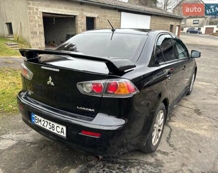 Чорний Міцубісі Lancer, об'ємом двигуна 2.36 л та пробігом 98 тис. км за 9250 $, фото 21 на Automoto.ua