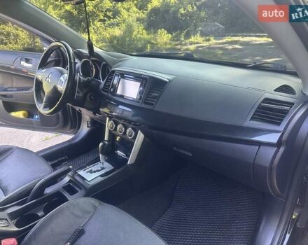 Черный Мицубиси Лансер, объемом двигателя 2.36 л и пробегом 178 тыс. км за 9300 $, фото 13 на Automoto.ua