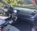 Черный Мицубиси Лансер, объемом двигателя 2.36 л и пробегом 178 тыс. км за 9300 $, фото 13 на Automoto.ua