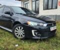 Чорний Міцубісі Lancer, об'ємом двигуна 2 л та пробігом 127 тис. км за 9600 $, фото 3 на Automoto.ua