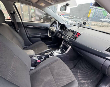 Черный Мицубиси Лансер, объемом двигателя 2 л и пробегом 156 тыс. км за 8999 $, фото 14 на Automoto.ua