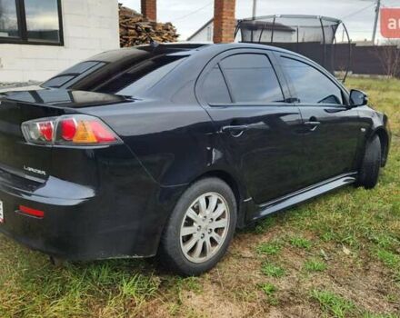 Чорний Міцубісі Lancer, об'ємом двигуна 2 л та пробігом 127 тис. км за 9600 $, фото 5 на Automoto.ua