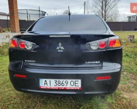 Чорний Міцубісі Lancer, об'ємом двигуна 2 л та пробігом 127 тис. км за 9600 $, фото 6 на Automoto.ua