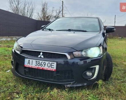 Чорний Міцубісі Lancer, об'ємом двигуна 2 л та пробігом 127 тис. км за 9600 $, фото 1 на Automoto.ua
