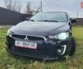 Чорний Міцубісі Lancer, об'ємом двигуна 2 л та пробігом 127 тис. км за 9600 $, фото 1 на Automoto.ua
